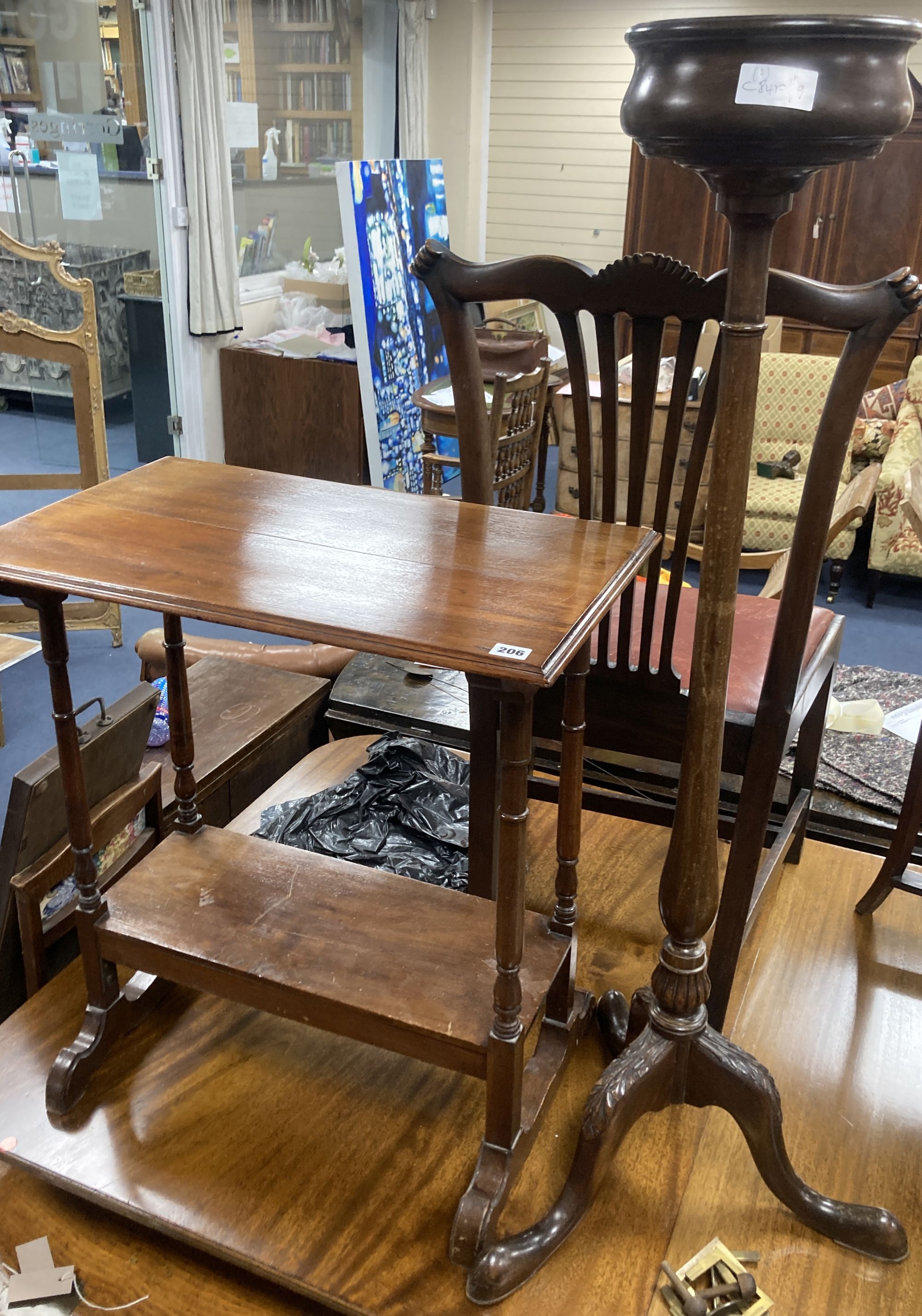 A 1920s mahogany tripod oil lamp standard, height 115cm and a two tier occasional table